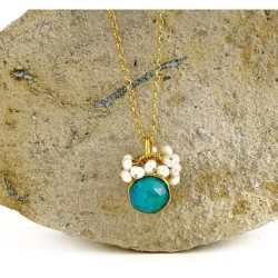 Blue stone pendant with pearls
